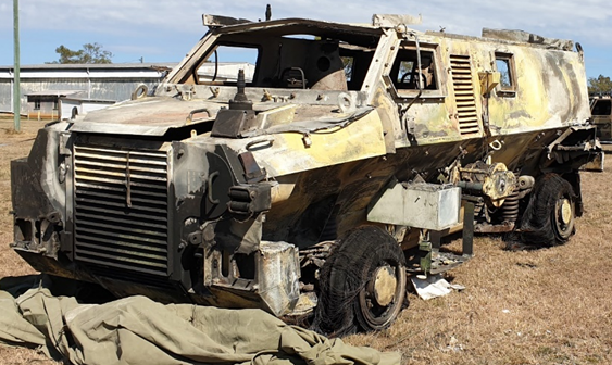 A burnt out vehicle.