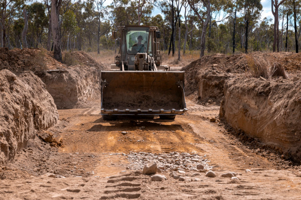 Earth being dug by an earth mover.