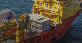 Mining accommodation stacked on an offshore mining vessel.