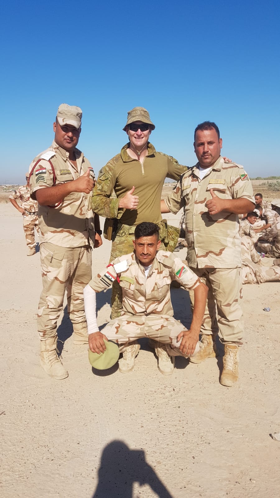 CPL Jaymes Hasler with the Iraqi Army soldiers