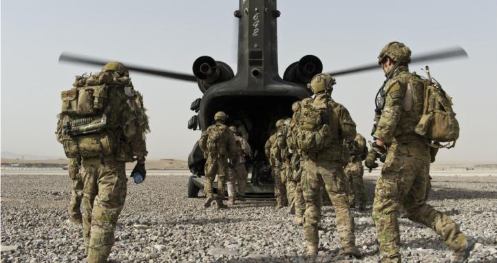 Soldiers boarding an airplane.