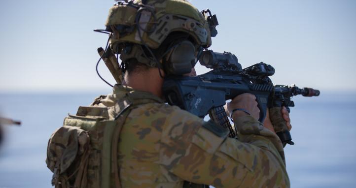 Soldier holding a gun.