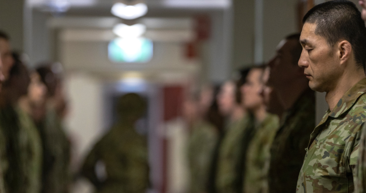 Soldiers standing in a corridor.
