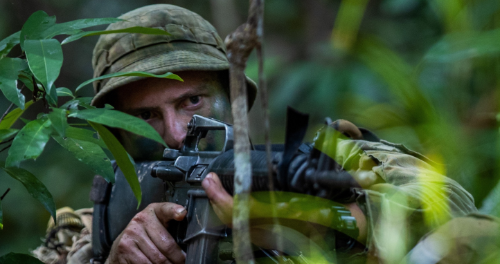 A soldier in the jungle.