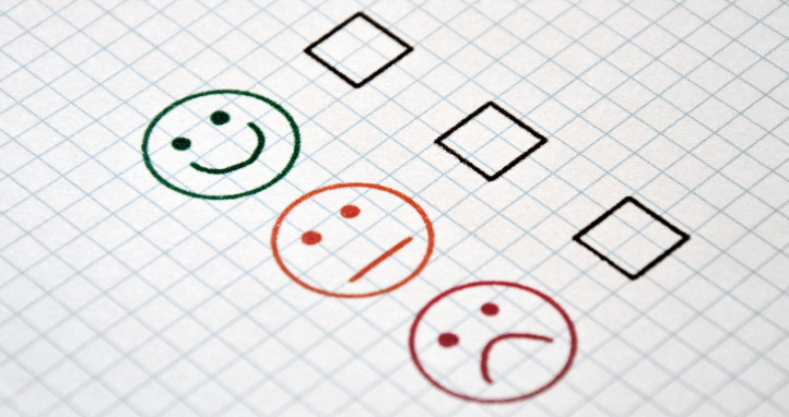 Feedback checklist with smiling faces.