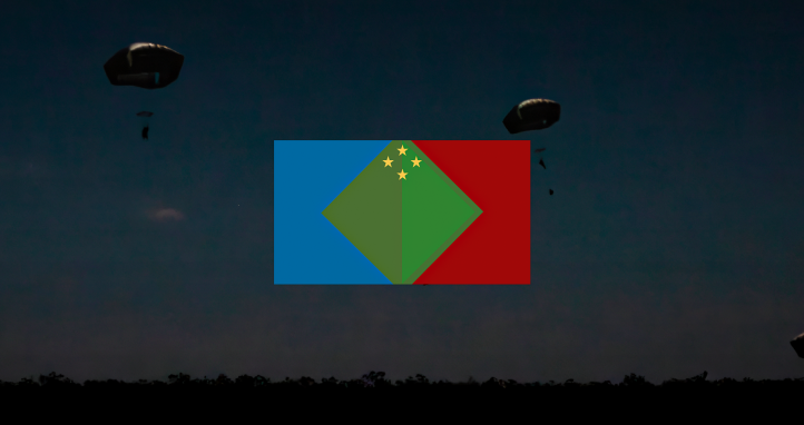 The fictitious Olvana flag on a background of soldiers in parachutes.