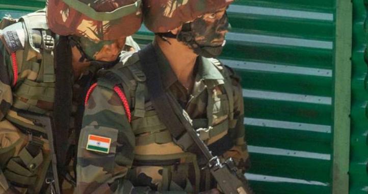 Indian army soldiers in a room clearing demonstration.