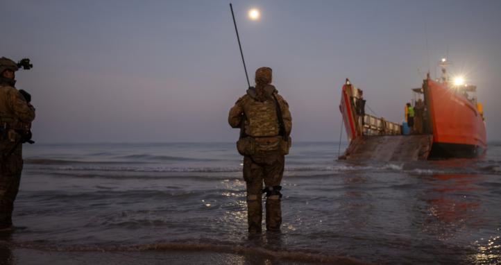 The 1st Combat Service Support Battalion’s Littoral Beach Team manoeuvre a JD850 Bulldozer.