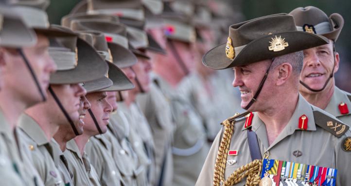 Forces Commander and parade reviewing officer, Major General Chris Field AM, CSC, inspects Australian soldiers.
