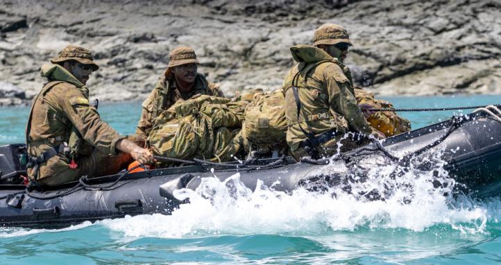 An Australian Army captain and two soldiers on a reconnaissance and surveillance patrol.