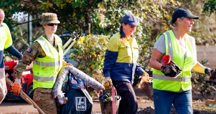 Australian Army Reserve soldiers clear debris to support a New South Wales State Emergency Service-led flood response.