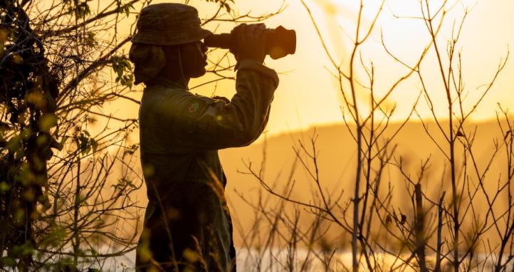 An Australian Army soldier from North-West Mobile Force uses a spotting scope to conduct surveillance of the northern Kimberley region of Western Australia in October 2024.