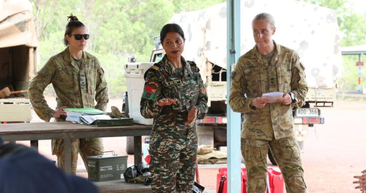 A Lieutenant from the Timor Leste Defence Force translates range instructions from an Australian Army Lieutenant ahead of a live-fire range shoot.