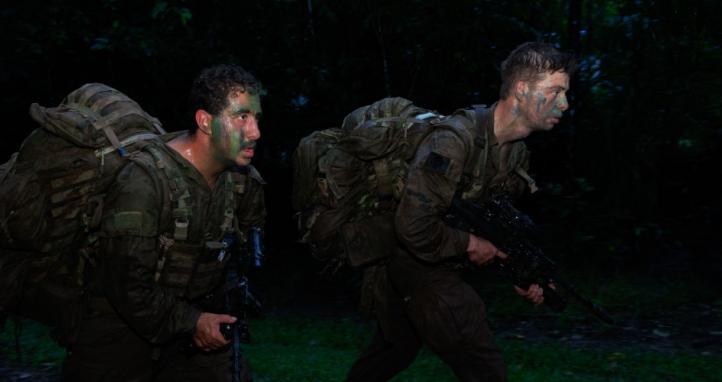 Soldiers from the Australian Army and troops from the French Armed Forces in New Caledonia conduct an exercise.
