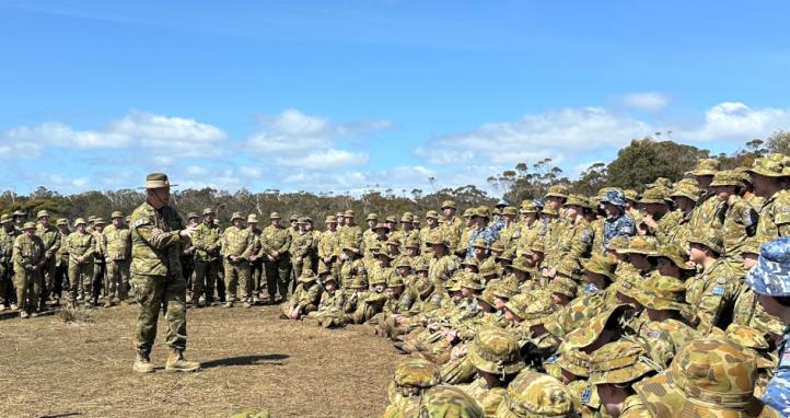Army and Air Force cadets at the Tasmania Battalion Annual Field Exercise attend a speech.