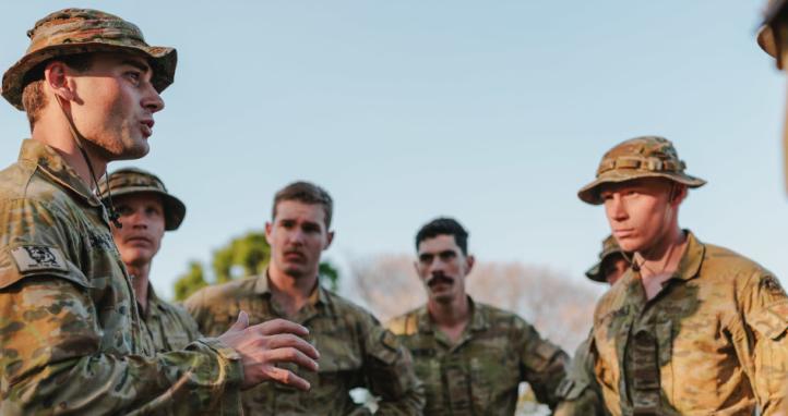 A soldier from the 6th Battalion, The Royal Australian Regiment, delivers orders to his section during the Duke of Gloucester Cup 2025, in Townsville, Queensland.