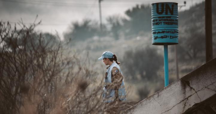 An Australian Army officer walks near the demarcation line between Lebanon and Israel and Lebanon and the Golan Heights while deployed on Operation Paladin.
