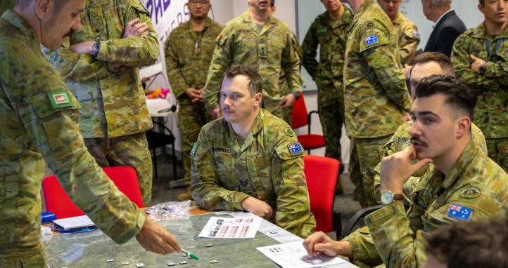 Australian Army personnel brief Major General Richard Vagg during a bilateral war game with members of the Japan Ground Self-Defense Force.