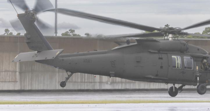 Australian Army UH-60M Black Hawk from 6th Aviation Regiment prepares to take off during the conduct of helicopter insertion and extraction training with the 2nd Commando Regiment at Holsworthy Barracks, Sydney, New South Wales.