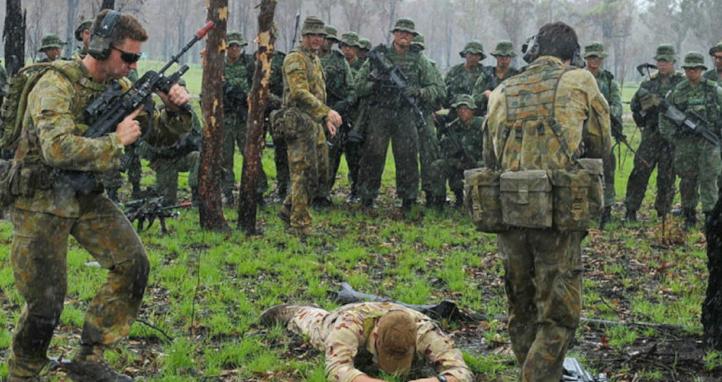 Soldiers take a prisoner during an exercise.