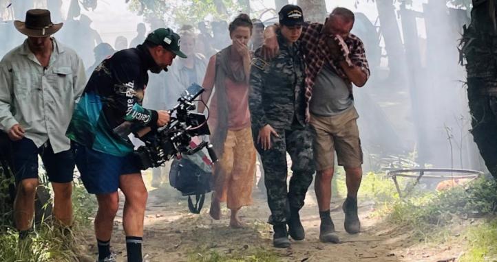 Director of Photography Jeremy Rouse films for the production of a bushfire scene in the new Defence advertising campaign for Navy careers ‘Live a Story Worth Telling’.