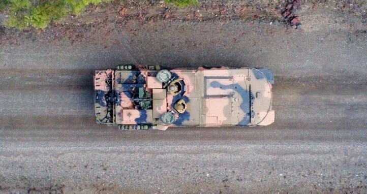 Australian Army soldiers from 2nd/14th Light Horse Regiment crew a Boxer Combat Reconnaissance Vehicle (CRV) during training at Wide Bay Training Area.