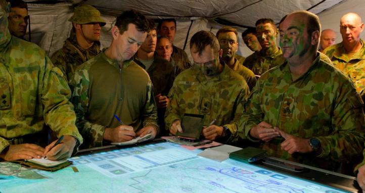 An Australian Army Commander briefs during the Rehearsal of Concept drill for brigade live fire activity.