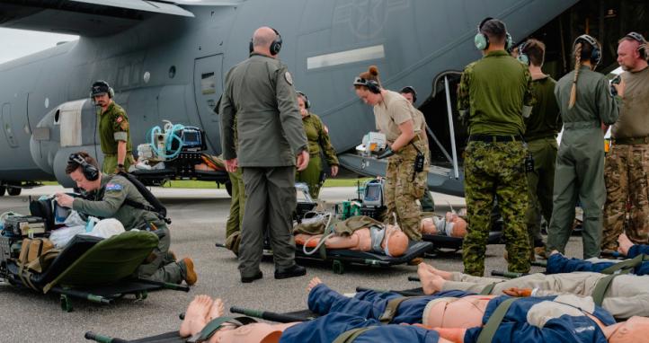 Clinicians from the Royal Australian Air Force, Royal New Zealand Air Force, Royal Air Force, United States Air Force and Royal Canadian Air Force conduct an aero-medical evacuation as part of Exercise Mobility Guardian 2025.