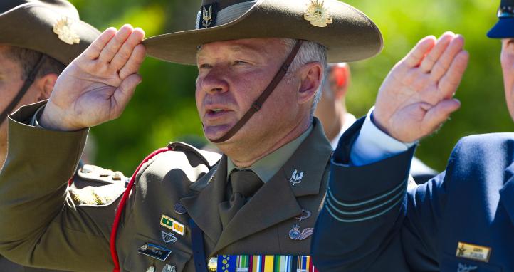 Senior officers saluting during National Anthem