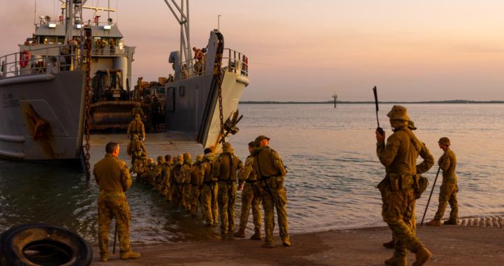 Australian Army soldiers board a United States Army Landing Craft Utility 2020 during Exercise Predator's Run.