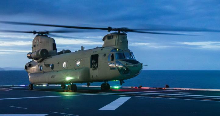 An Australian Army CH-47F Chinook conducts pre-flight preparations on HMAS Canberra.