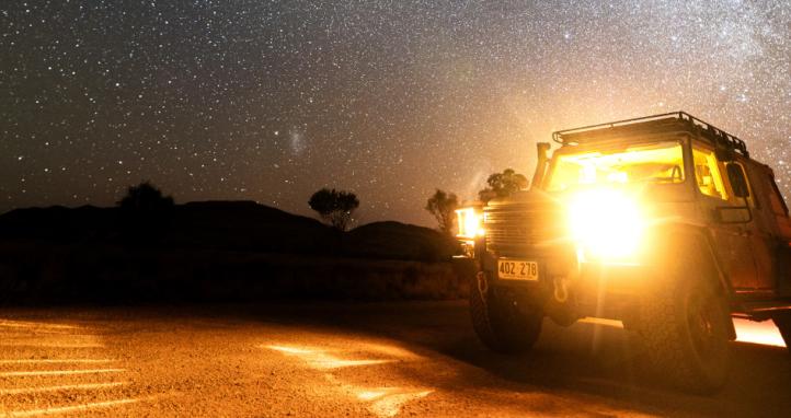 An Australian Army G-Wagon underneath the Milky Way in the southern hemisphere night sky.