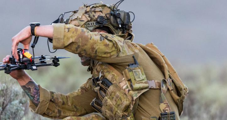 An Australian soldier handling an FPV drone.