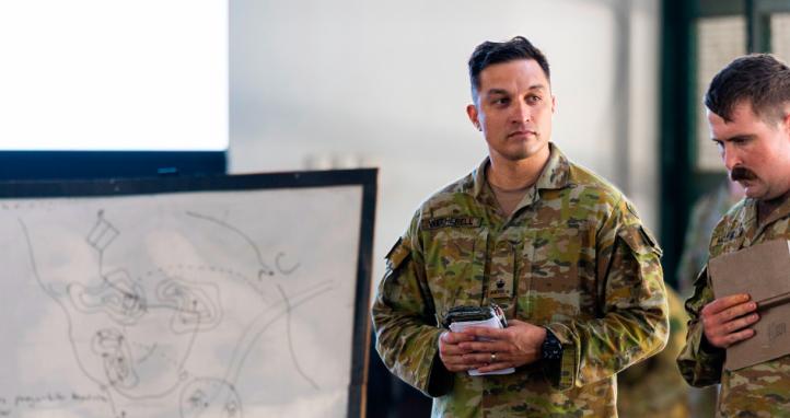 Australian Army officers instruct on the military appreciation process component of the Junior Officers Combat Instructor Training.