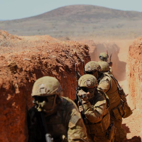 Australian Army Soldiers assault a trench system during Exercise Rhino Run 2023.