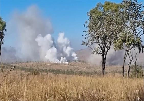 Smoke and white phosphorus clouds