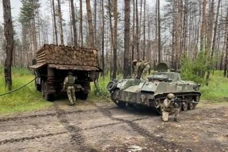 Russian military disguising fuel trucks as logging trucks.