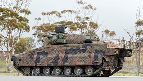 A SolarSigmaShield Mobile Camouflage System (MCS) applied to a tracked Redback infantry fighting vehicle (IFV).