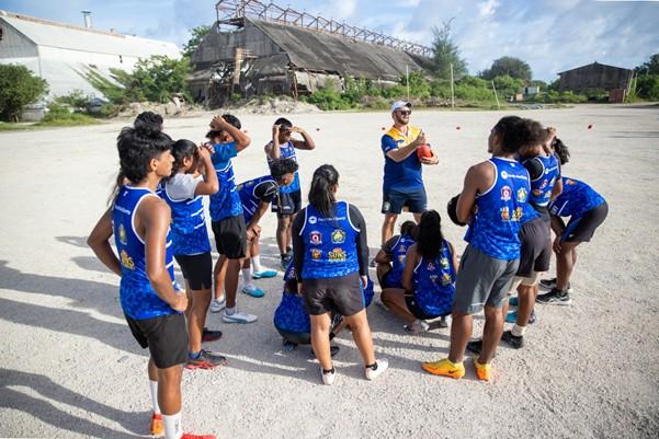 Nauru children playing Australian Rules Football
