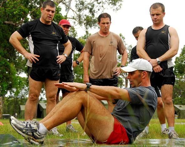 A man doing situps.