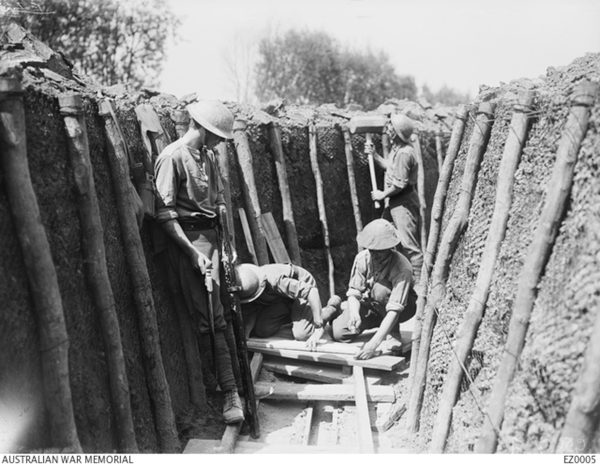 Australian Pioneers building a communication trench. Communication trenches led up to the front