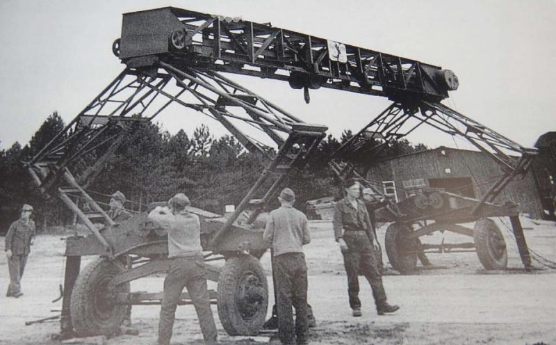 Setting up the Strabokran moving gantry. Mobile gantries could lift Maybach tank engines or turrets. The gantry could be folded for transport and converted into a trailer.
