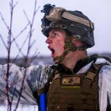 Soldier yelling in the snow.
