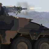 A tank firing into the distance.
