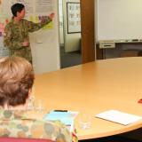 Deputy Adjutant General Colonel Suzanne Melotte presenting to Major-General Angus Campbell.