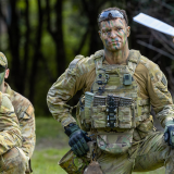 Soldiers receiving a brief.