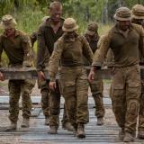 Australian Army sappers remove timber planks from Elanora Bridge to lay high explosive charges.