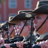 Australian Army soldiers from the Royal Australian Corps of Transport conduct a general salute.