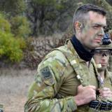 Australian Army soldiers receive orders as part of an exercise.