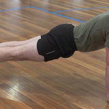 A soldier demonstrating a push-up